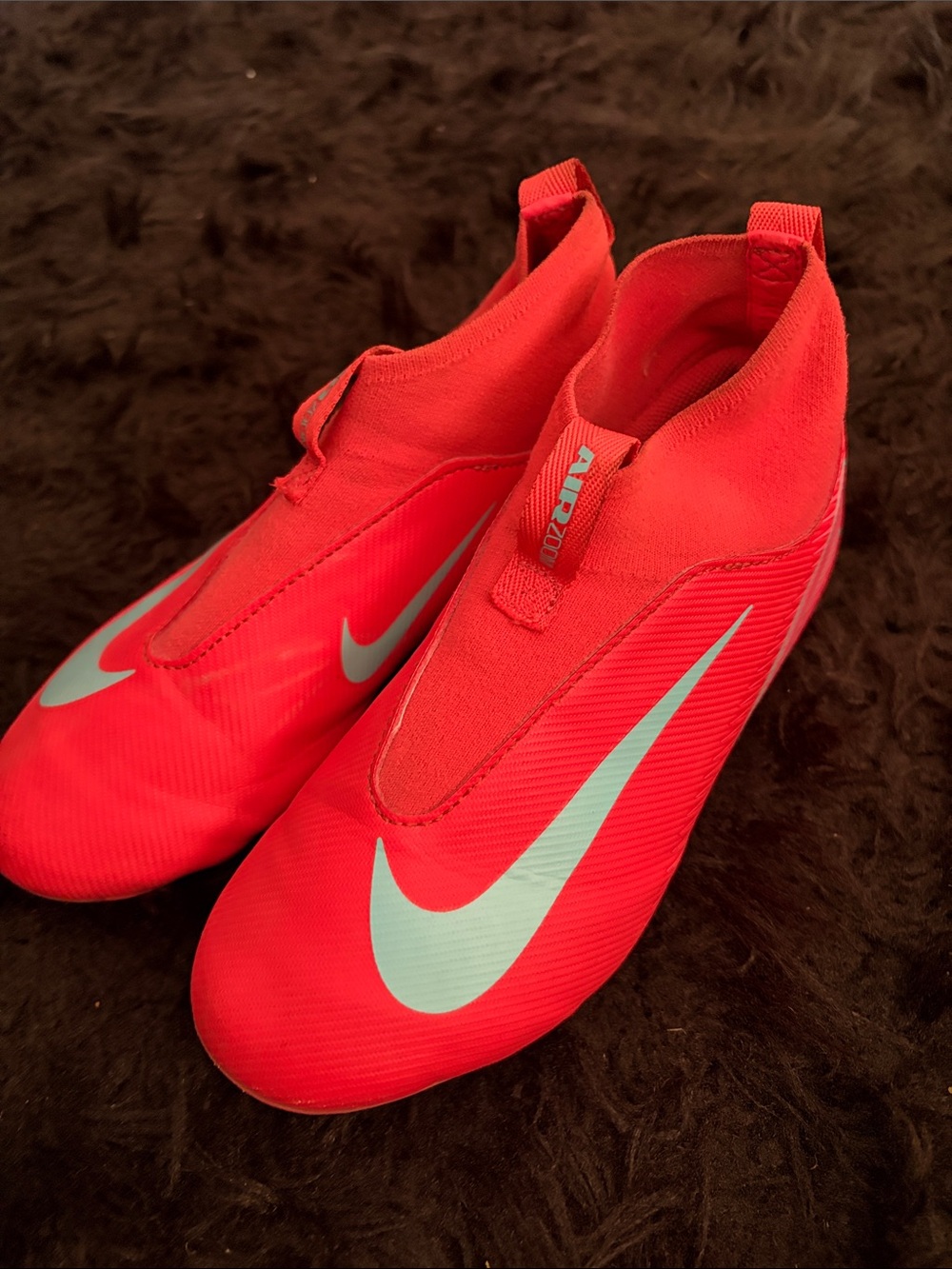 Nike Kids pink Slip-On Athletic soccer cleats